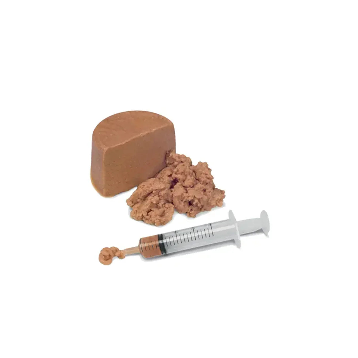 zigly soft brown pet food block with textured paste and a syringe for feeding