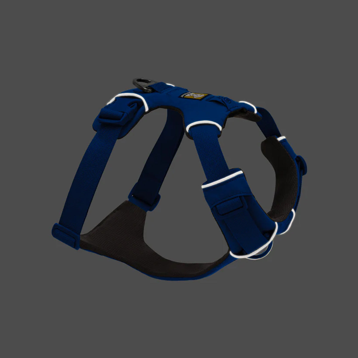 Zigly blue adjustable dog harness with reflective trim on dark background