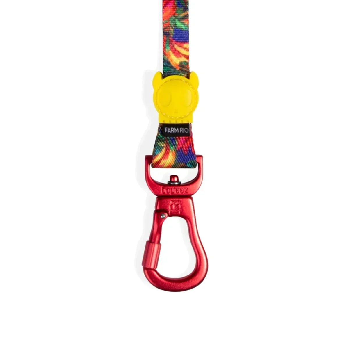 Colorful dog leash with zigly pattern, yellow bear-shaped connector, and red metal clip