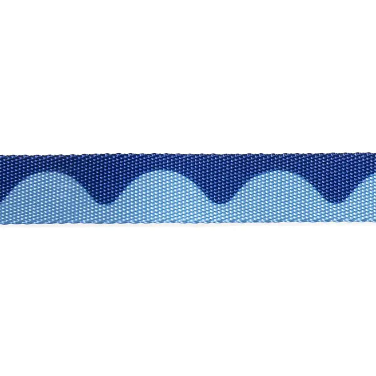 Zigly woven blue ribbon with light blue scalloped wave pattern textile detail