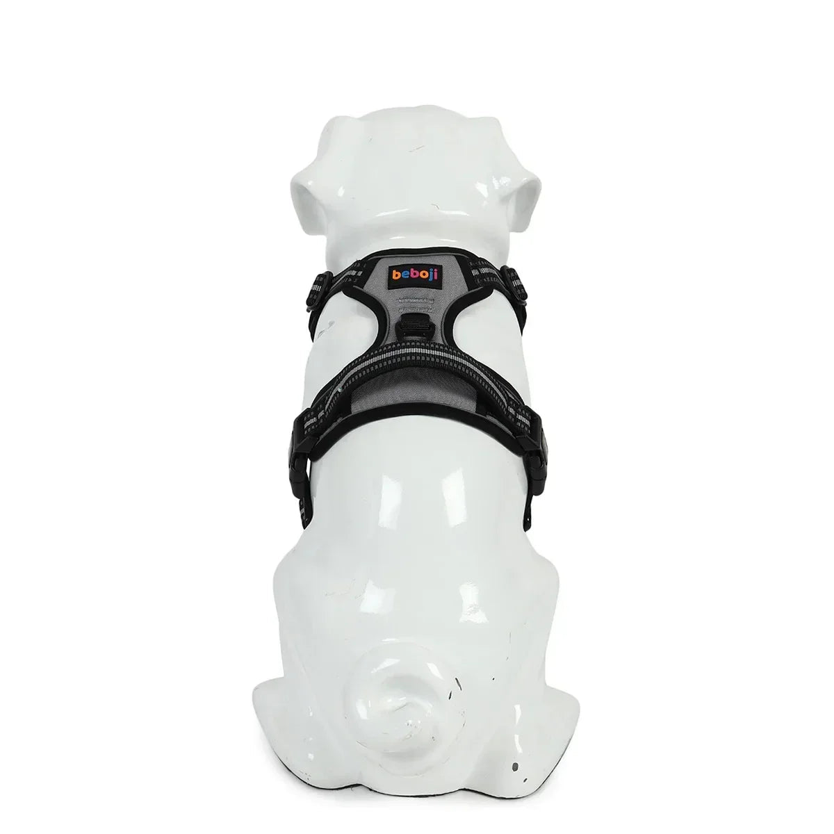 White dog mannequin wearing black and gray beboji dog harness with zigly branding