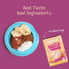 Zigly real chicken liver dog food with real ingredients in a blue bowl and chicken liver packet on purple background