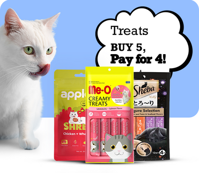 Cat next to cat treats with promotional text on a blue background