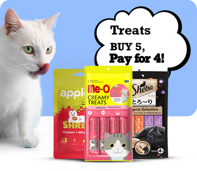 Cat next to cat treats with promotional text on a blue background