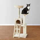 A black and white cat sitting on a beige Zigly Lifestyle Celeste cat tree with scratching posts.