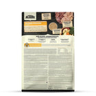 Back of Acana Prairie Poultry dry dog food bag with ingredients and feeding guide, zigly.