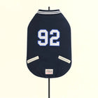 Zigly navy dog jacket with white striped collar, number 92, and side pockets