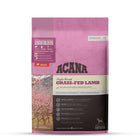 Acana grass-fed lamb dog food bag, pink and cream with farm scene and zigly branding visible