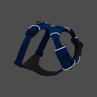 Zigly blue adjustable dog harness with reflective trim on dark background