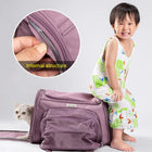 Zigly purple pet carrier with mesh pockets and internal structure detail, child sitting and white cat inside
