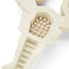 Zigly beige textured massage tool with raised nodules and ridges for muscle relief