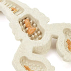 Zigly textured beige dog interactive feeder with peanut butter in compartments