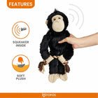 zigly soft plush black monkey dog toy with squeaker inside held by hand with rope limbs