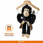Zigly black plush gorilla dog toy with rope, hanging on wooden hanger, machine washable
