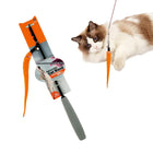 Zigly retractable cat wand toy with orange worm and playful cat on white background