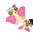 Zigly pink and yellow butterfly dog toy with a beagle playing on white background