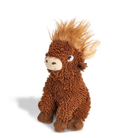 Zigly textured brown plush highland cow toy with fuzzy mane sitting on white background