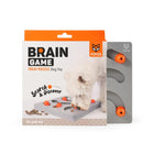 zigly Brain Game treat puzzle dog toy by FOFOS with white dog playing, interactive pet game