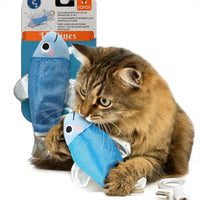 Tabby cat playing with blue fish-shaped catnip toy, Zigly brand pet toy with silver fins