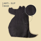 Zigly black anti-slip base mat with dotted texture in a unique shape on beige background