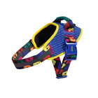 Zee.dog dog harness with blue mesh, yellow trim, and colorful floral patterned straps featuring zigly design