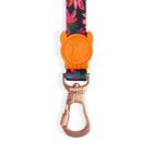 Zigly floral pet leash with orange skull detail and rose gold metal clip