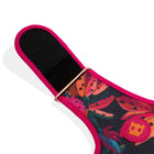 Zigly floral fitness wrist strap with pink trim and black Velcro closure