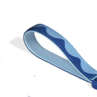 Blue zigly wrist strap with wavy pattern looped on white background