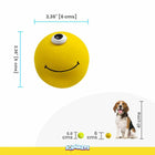 Zigly yellow one-eyed smiley ball for dogs, 2.36 inch size, shown next to a beagle for scale
