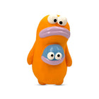 Zigly orange cartoon character toy with purple lips and a smaller blue character on its belly