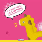 Zigly yellow giraffe toy made from 100% natural latex rubber with pink speech bubble on pink background