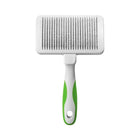 zigly pet grooming slicker brush with white and green handle on white background