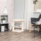 Zigly white cat playing with beige cat scratcher in modern living room with grey chair and plant