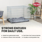 Zigly galvanized metal dog crate with two doors, plastic tray, and gray bedding in modern room
