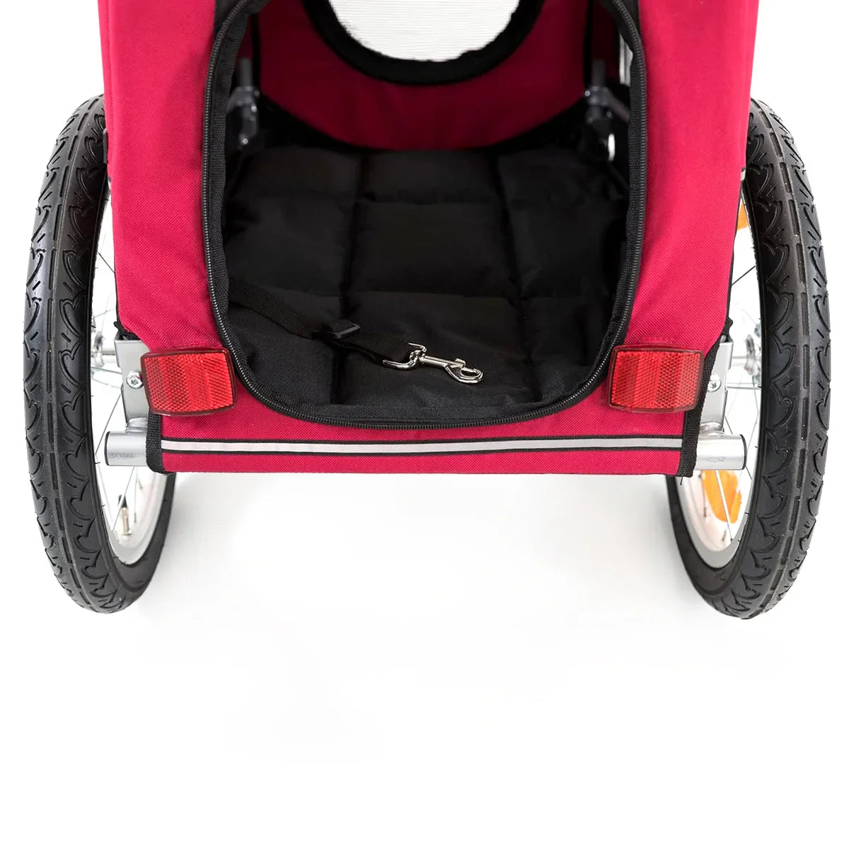 Zigly red pet stroller with black interior padded seat and safety leash clip on white background