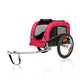Zigly red pet bike trailer with mesh windows and two large wheels on white background