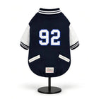 Zigly Lifestyle navy varsity campus pup jacket for dogs featuring white sleeves and number 92