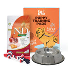Zigly puppy essentials combo with food, training pads, rope toy, and metal bowl