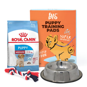 Zigly puppy care set with Royal Canin medium puppy food, Fur Pro training pads, metal bowl, and rope toy